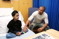 Chris Eubank Jr with heart patient Abuzar from Pakistan